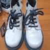0406bd19-d44d-42b5-aae2-80805d571218.jpeg Botas niña estilo militar beige y negro – talla 29
