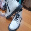 2d411541-c99c-4f89-8a45-4f021644b9e8.jpeg Botas niña estilo militar beige y negro – talla 29