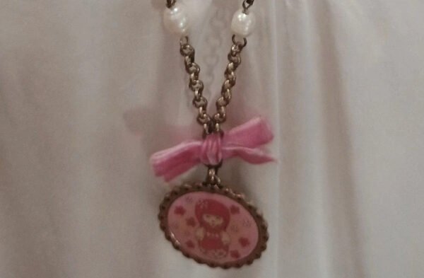 Collar kawaii rosa con lazo y colgante infantil estilo cute
