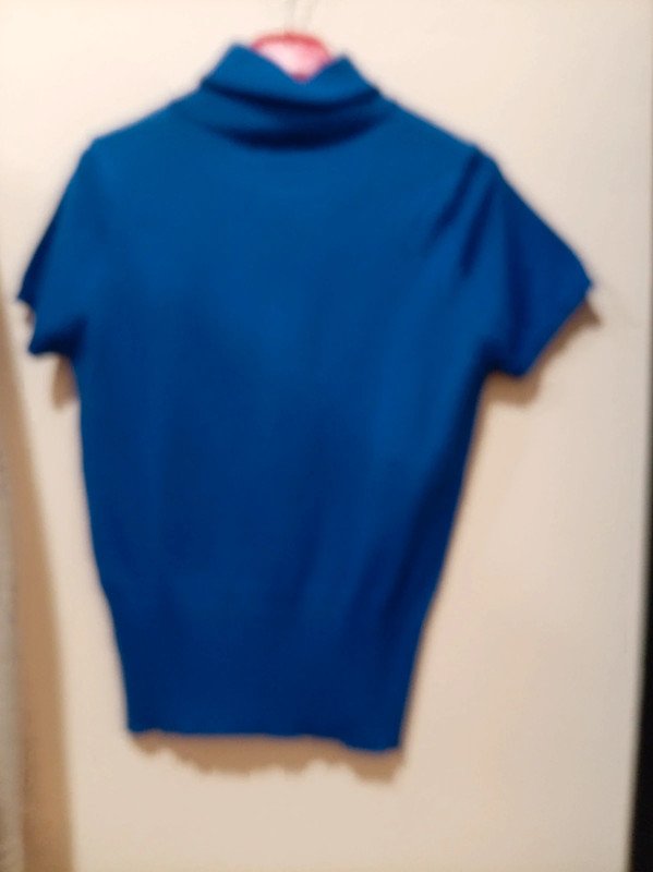 Jersey azul cuello alto Milk & Honey M