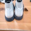 a9d7fed7-f47e-4d74-afef-9c0d8da5f59f.jpeg Botas niña estilo militar beige y negro – talla 29