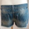 file_00000000728071f49918f057aea52709 Short vaquero con flores margaritas denim talla 40 verano