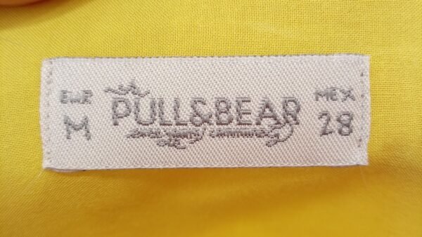 file_00000000238c720aac87b5f7321b4136 Conjunto mujer amarillo y marrón con collar